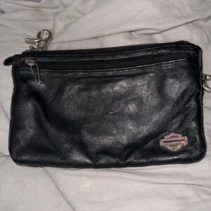 Harley Davidson cool black leather bag with silver d rings and has 3 pockets